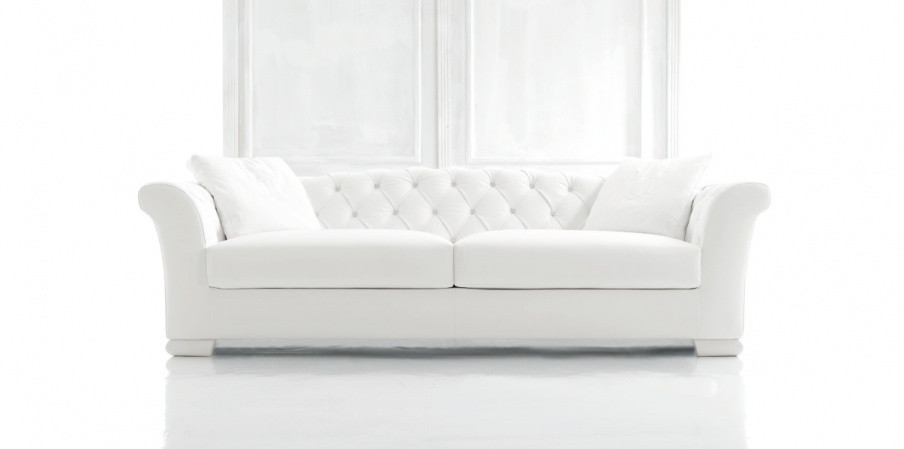 The four-seater sofa with decorative stitch Vision Tosconova