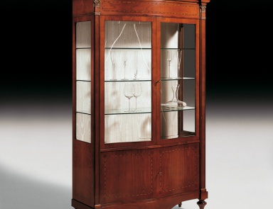 A display case with shaped legs, Medea