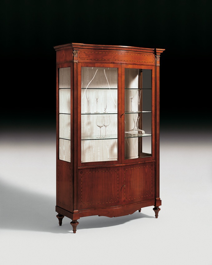 A display case with shaped legs, Medea