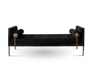 A couch with brass trim Prive, Koket