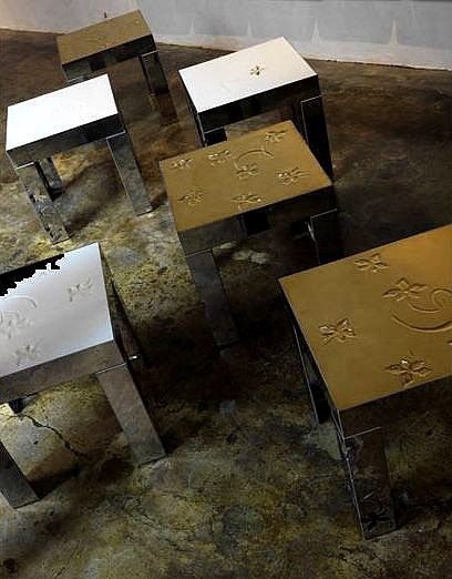 A coffee table on a frame of stainless steel Lul Mussi