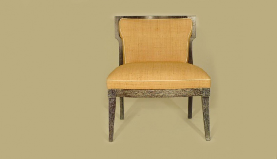 The chair with the frame made of solid oak upholstered in fabric, Chelini