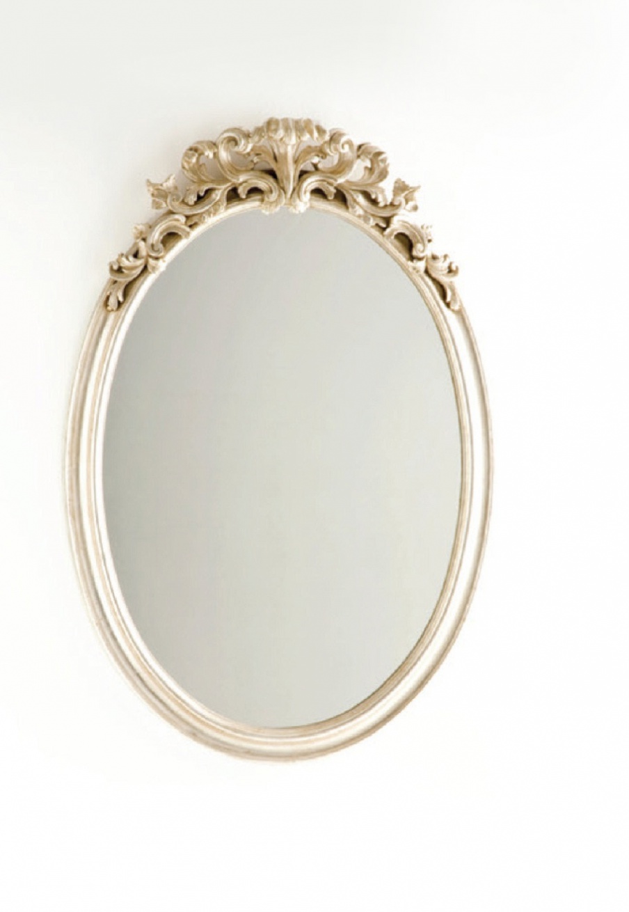 A wall mirror in a frame made of solid wood, Chelini