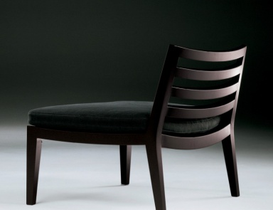 A chair on a frame of solid walnut with leather or fabric upholstery Afro, Flexform