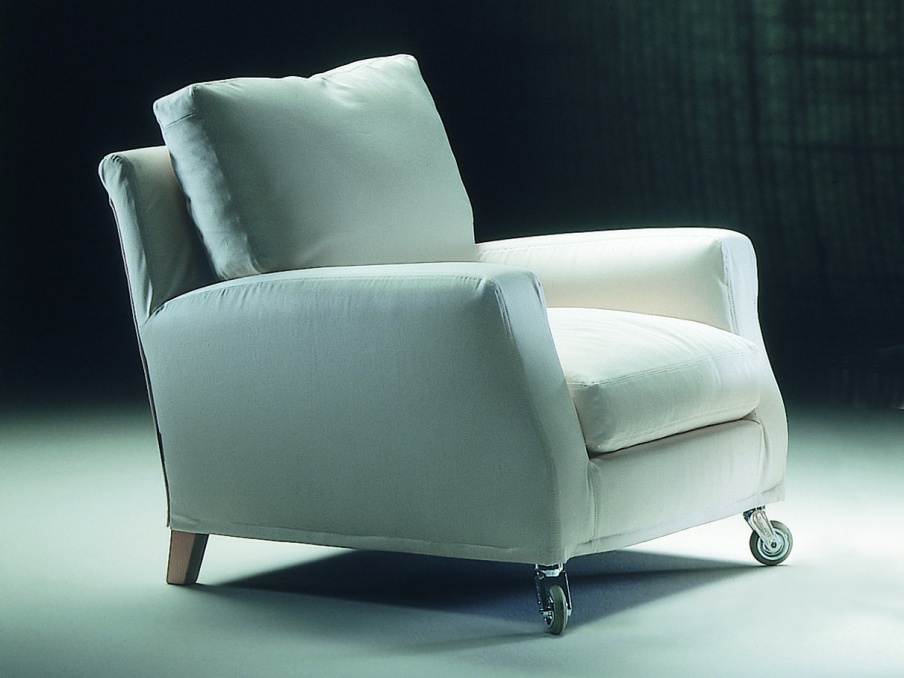 A chair on a frame of wood covered with leather or fabric Eduard, Flexform