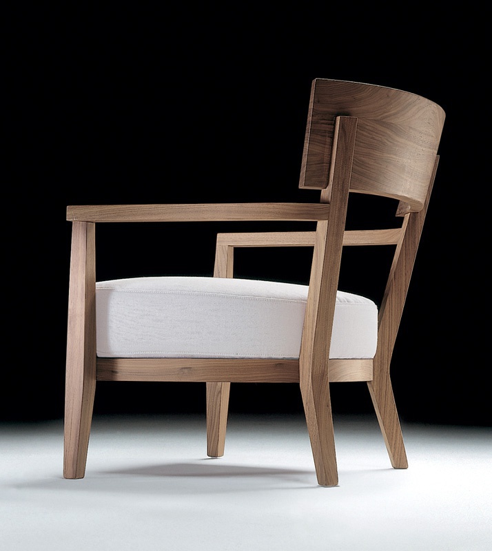 The chair frame is made of walnut or ash wood, upholstered in leather or fabric Sally, Flexform