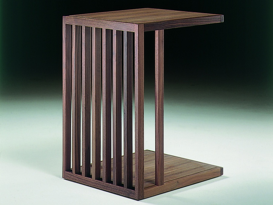 A coffee table on a frame of walnut or beech Vienna Flexform