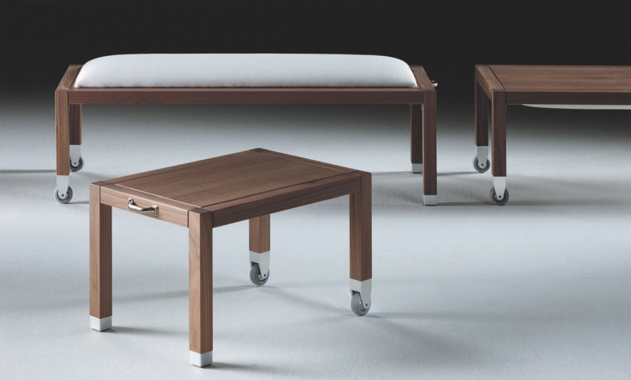 A coffee table on a frame of maple or walnut Zanzibar, Flexform