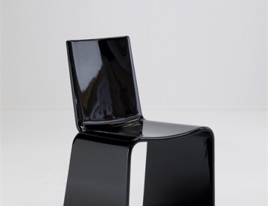 The chair rounded shapes of molded plastic, Nora - Porada