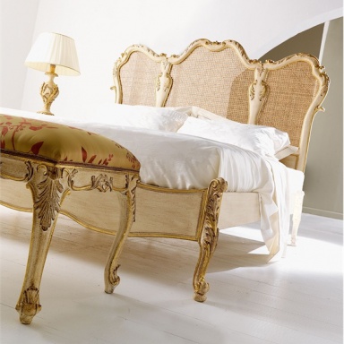 Bed with wicker headboard